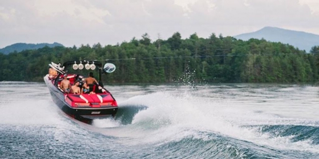 Axis Wake A22 pulling an expert wakeboarder behind near muskoka.